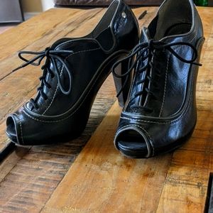 Black Fergalicious peep toe heels